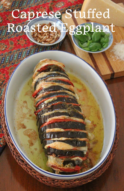 Food Lust People Love: Caprese Stuffed Roasted Eggplant is a showstopper of a main course, guaranteed to be loved by vegetarians and omnivores alike. After all, who can resist ripe tomatoes, flavorful basil pesto and melty mozzarella roasted in a hasselback-cut eggplant?