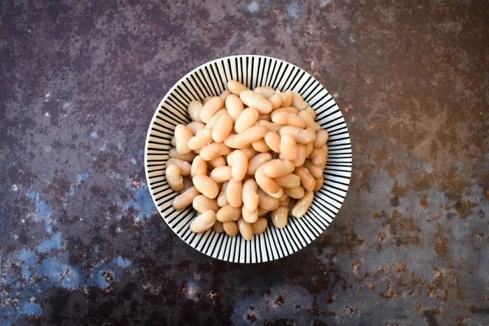 white beans bowl of cooked white beans